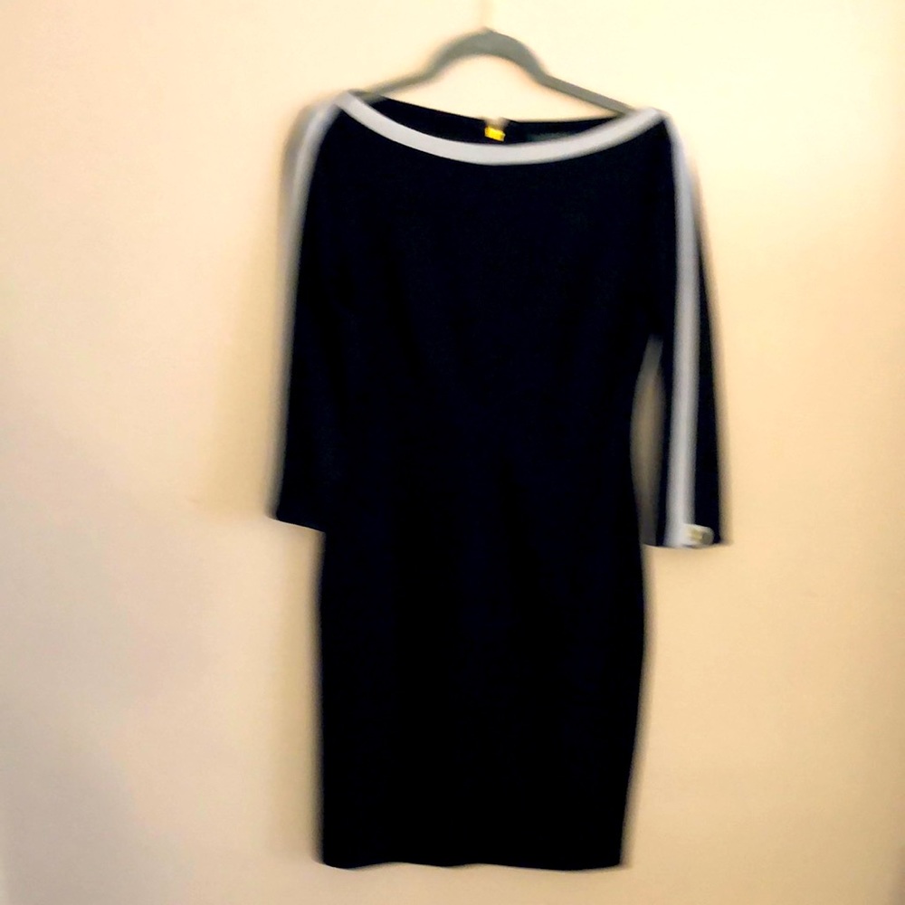 Like new. Black dress with a white details very comfortable .
